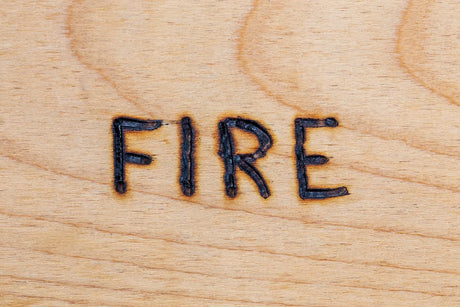 Fire rated plywood board with the text 'FIRE'