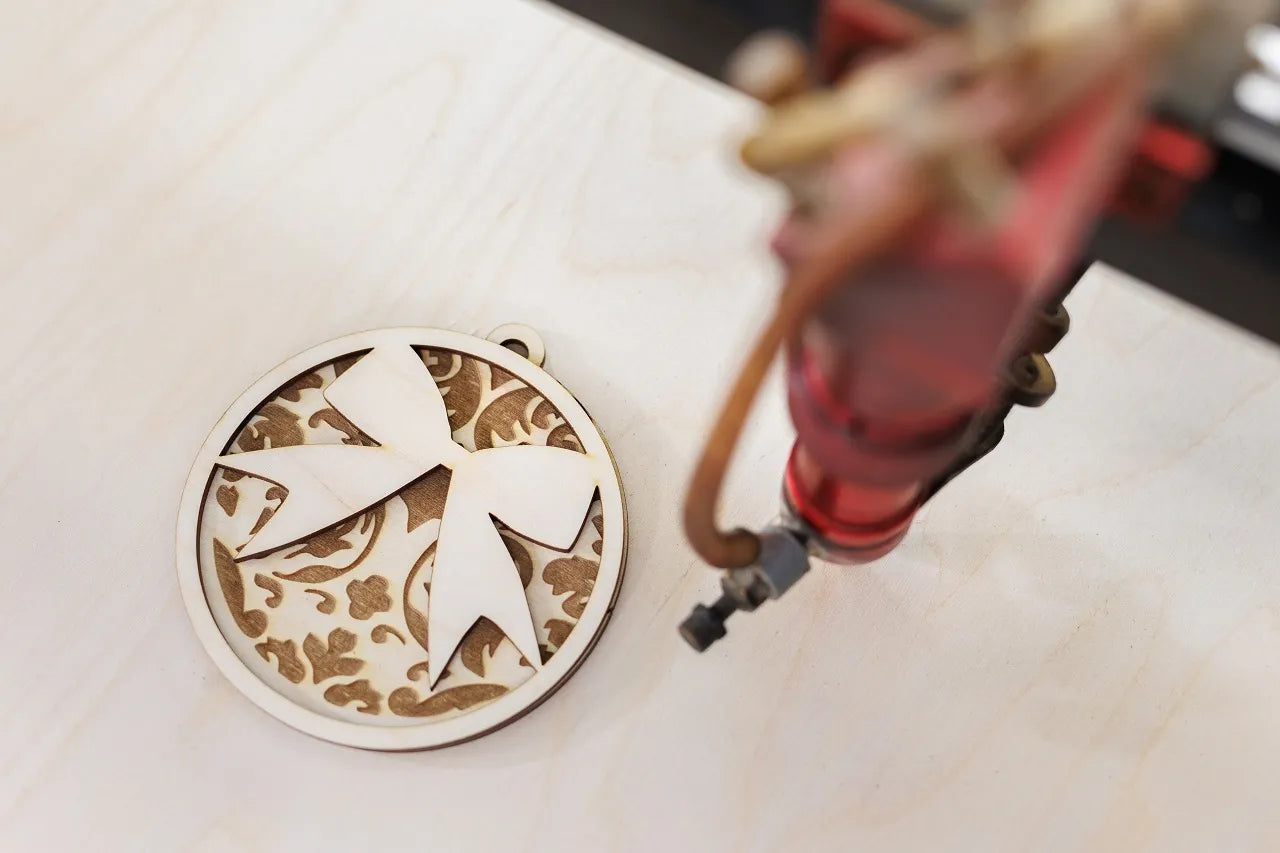 Plywood laser cut decoration under the tool