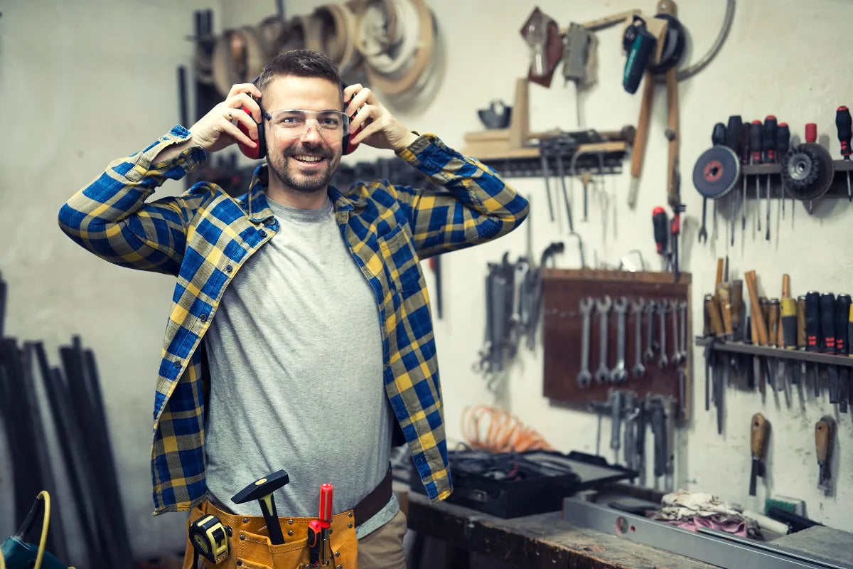 A smiling man in the workshop