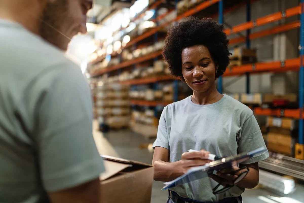 A man and a woman in warehouse